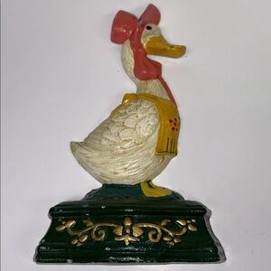 Vintage 11” hand painted cast iron “MotherGoose” doorstop/ bookend